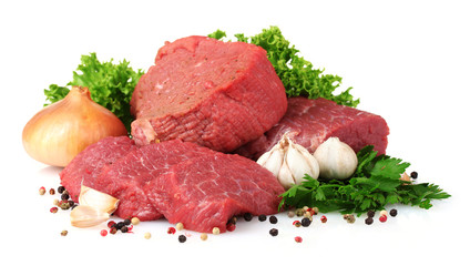 raw meat, vegetables and spices isolated on white