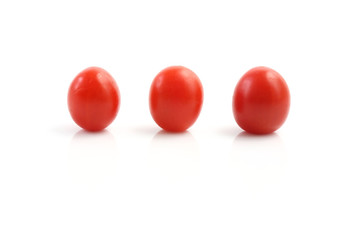 Cherry tomatoes isolated in white background