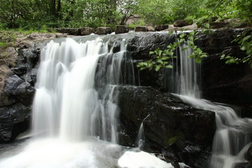 Fototapeta na wymiar Waterfall in a park