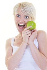 happy  young  woman eat green apple isolated  on white