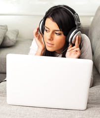 young woman listening to music