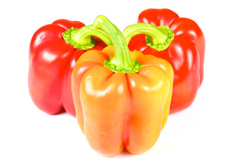 Orange and red pepper isolated on white
