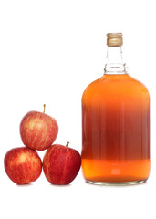 bottle of cider with apples