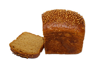 Half of rye bread with anise and some slices isolated