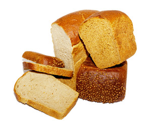 Half of rye bread with anise and some slices isolated