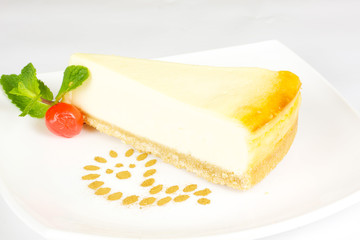 Gourmet slice of cheesecake on the white background