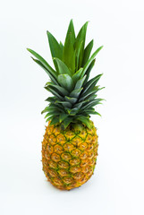 fresh pineapple fruits with green leaves