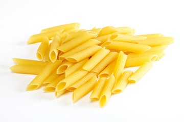 dried italian pasta on white background