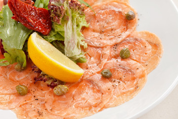 Fish Carpaccio with salad