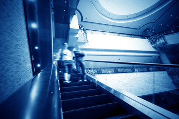 People on the escalator