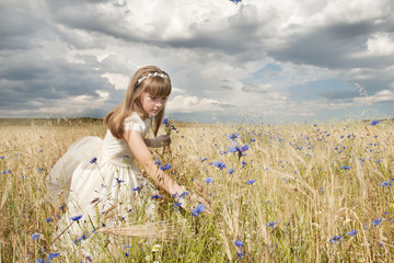 girl wearing first communion dress