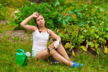 Young woman in kitchen-garden