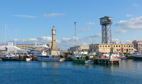 ships and tower in barcelonian port