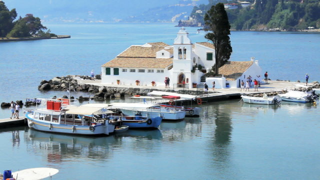 Tourist boats near Vlacherna monastery, Kanoni, Corfu, Greece