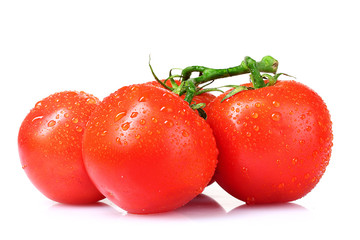 Beautiful fresh tomatoes isolated on white