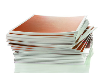 many magazines isolated on white