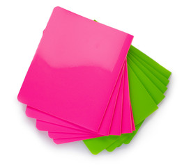 green and pink notebook isolated on white