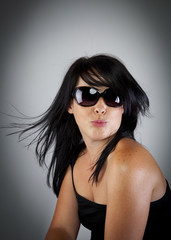 Cute girl kissing at camera