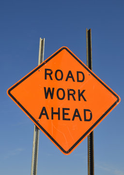 Road work ahead warning sign