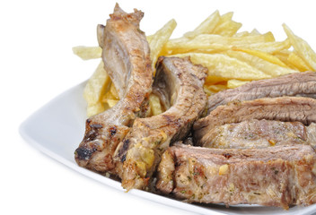 Costillas con patatas.