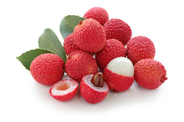 fresh lychees on white background