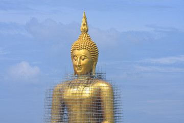 Big Golden Buddha with sky at Wat Muang, Ang Thong Province, tha