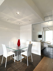 sala da pranzo con tavolo quadrato e vista sulla cucina
