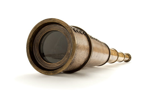 Closeup of antique spyglass, isolated on white.