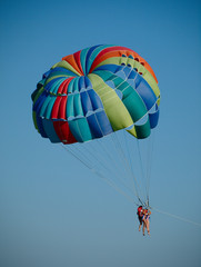 Parasailing in the blue sky