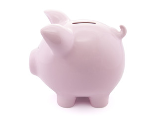 Side view of pink piggy bank with clipping path