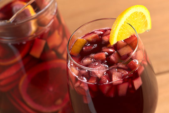 Refreshing red wine punch called sangria with fresh fruits