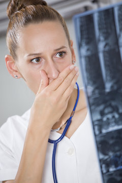 Shocked Doctor With X-ray Scans