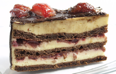 Delicious cake with chocolate and vanilla cream