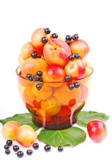Fresh fruit, apricot, plum, currants in a bowl