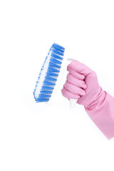 hand wearing pink rubber glove hold clean brush.