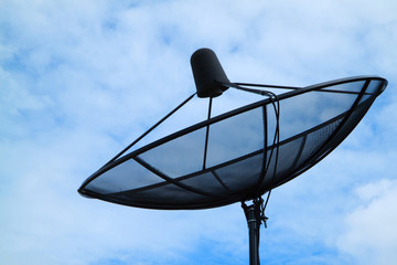 Satellite dish on blue sky