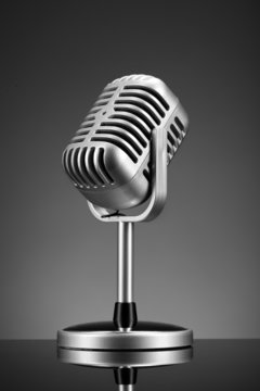 Retro microphone on grey