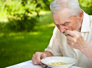 senior man eating