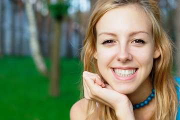 Smiling teenage girl at the park