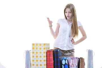 happy young adult women  shopping with colored bags