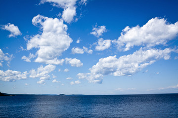 Naklejka na ściany i meble Blue Sky with big lake