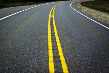 Asphalt Background with yellow stripes