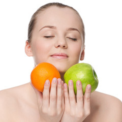 Obraz na płótnie Canvas Woman eat green apple and orange