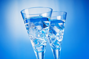 Water in the glass against gradient background