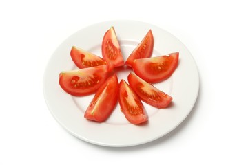 Tomatoes on white plate