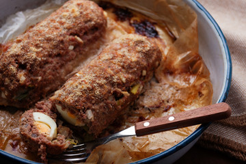 Meat roll stuffed with eggs