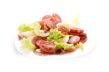 salad with salami and tomato