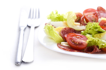 salad with salami, tomato