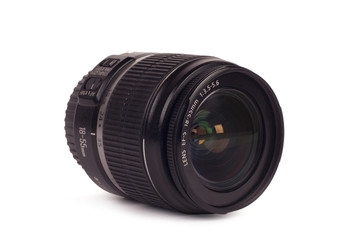 Black camera lens isolated in white background