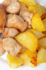 Bocconcini di pollo con patate al forno